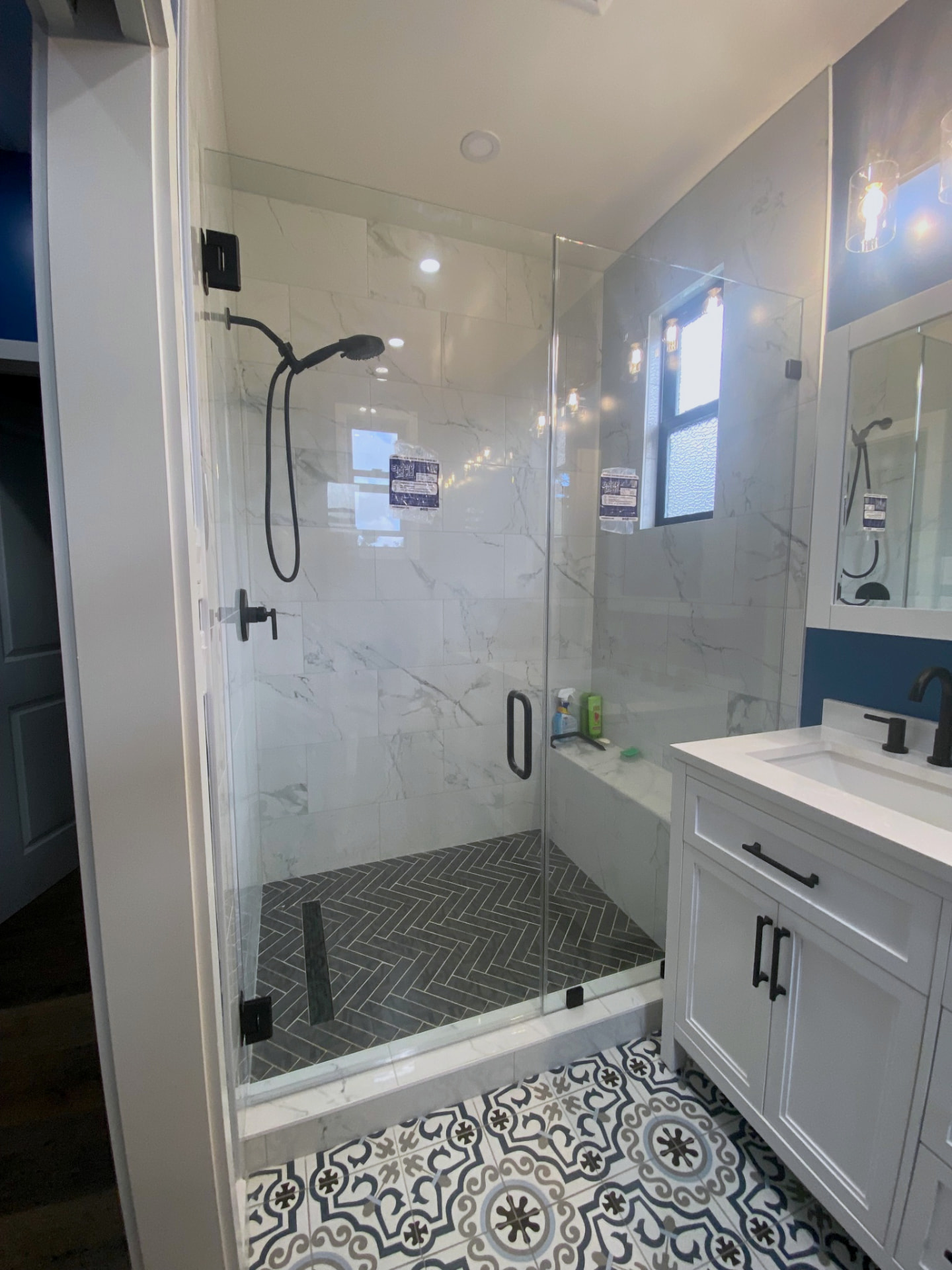 Marble Shower with Herringbone Floor - Kauai residence - Kauai glass project